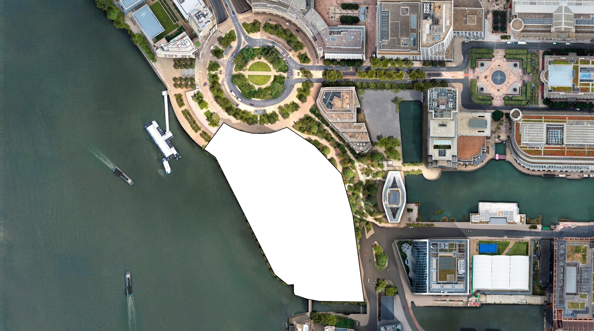 Aerial view of the Riverside South waterfront with the footprint of the future headquarters office shown in white beside Westferry Circus.